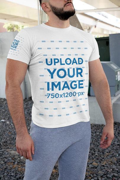 Mockup of a Strong Man Wearing a T-Shirt with Front and Sleeves Prints