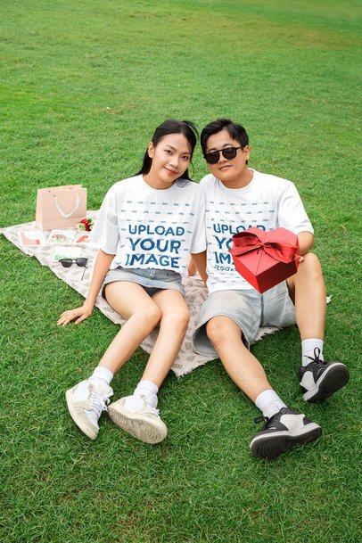 Oversized T-Shirt Mockup Featuring a Sweet Couple in a Valentine's Day Picnic