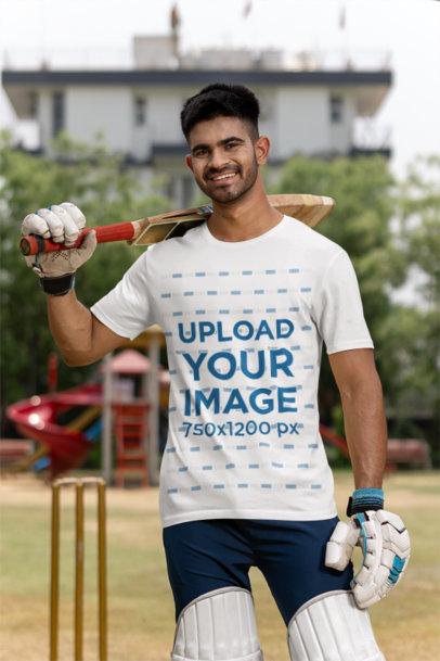 T-Shirt Mockup Featuring a Smiling Man Wearing Cricket Gear