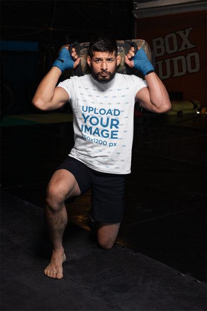 T-Shirt Mockup of an MMA Fighter Kneeling